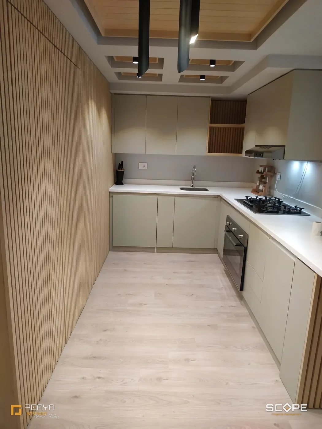 Fitted kitchen with timber slat wall